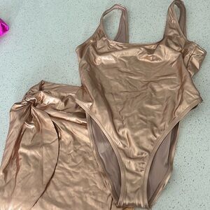 BRAND NEW never worn SKIMS Rose Gold metallic one piece with matching skirt